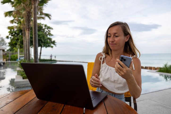 a woman working beachside